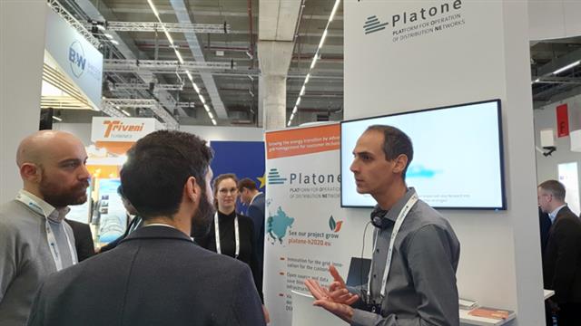 Ferdinando Bosco from Engeneering explainig the Platone approach to visitors at the Platone booth in the EU Projects Zone